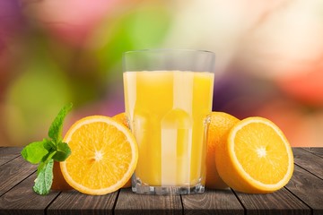 Orange juice and slices of orange on background © BillionPhotos.com
