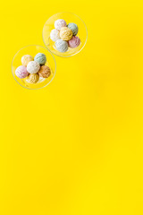 Ice-cream scoops in vase on yellow backgroung top view mockup