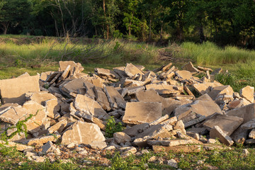 Large concrete debris with sunlight.