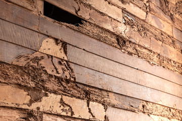 Old wooden walls that were bitten by termites.