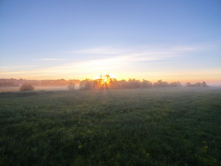 Fog on fields. Komi Republic