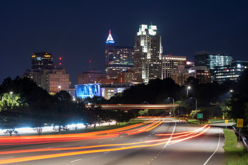 Looking towards the skyline of downtown Raleigh at blue hour