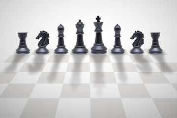 Business Competition Concept : Wooden chess pieces standing on chess board.