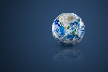 Fototapeta na wymiar Blue Planet Earth Globe put on floor. (Elements of this image furnished by NASA.)