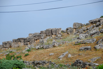 Limestone blocks an earthquake-destroyed wall of city of Hierapolis.