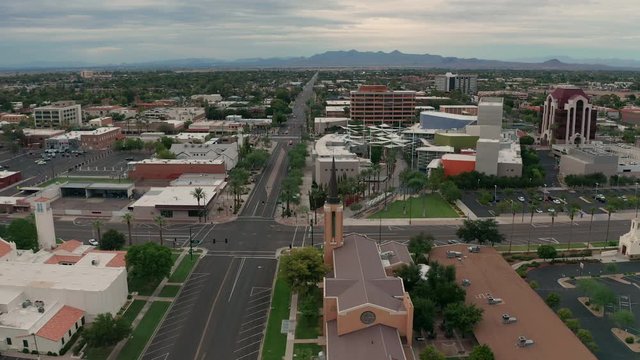 The buildings and streets of downtown Mesa Arizona around sunset