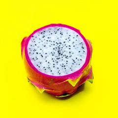 Pitahaya or dragon fruit on yellow background. Minimal exotic fruits art