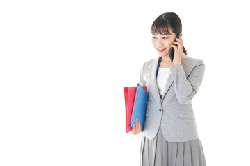 通話をするスーツを着たビジネスウーマン