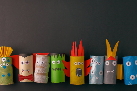 Halloween monsters doll from toilet paper tube roll. Creative DIY for kids. Home decor for party. Paper handie crafts inspiration. Eco-friendly reuse recycle idea