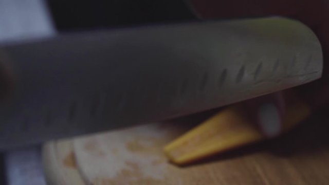 Women's hands wash, peel and cut vegetables into vegetable stew.