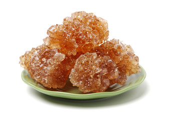 dark crystal sugar on white background