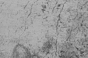 Obraz premium Texture of a concrete wall with cracks and scratches which can be used as a background