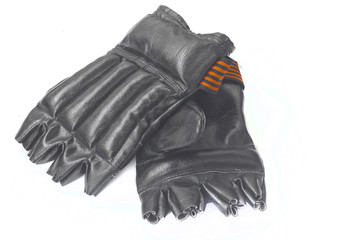 Black boxing gloves on white background.