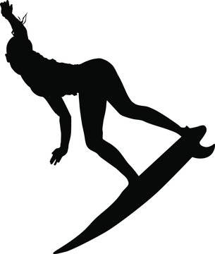 silhouette of a woman surfer 
