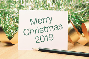 Merry Christmas 2019 with gold decoration.