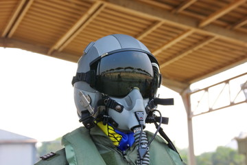 fighter pilot helmet and suit isolate on white background