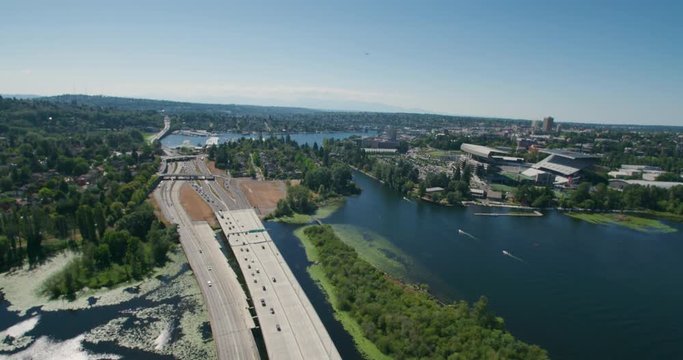 Beautiful Seattle Aerial Shot Directly Above Traffic on 520 Bridge and Foster Island - University of Washington Campus Montlake Cut