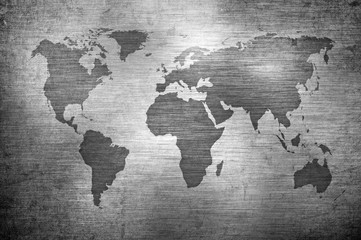 Fototapeta na wymiar grunge map of the world over brushed metal texture