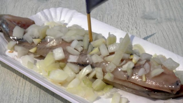 Herring with Onions, a traditional Dutch Raw Fish Snack