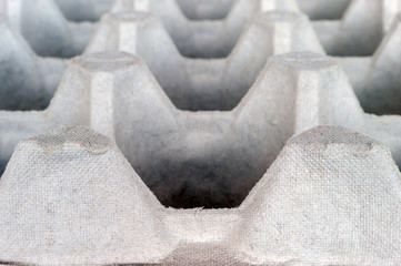 An Empty Biodegradable Molded Pulp Fiber Egg Carton Tray.