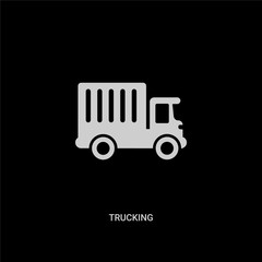 white trucking vector icon on black background. modern flat trucking from transport concept vector sign symbol can be use for web, mobile and logo.