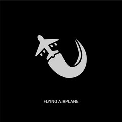 white flying airplane vector icon on black background. modern flat flying airplane from transport concept vector sign symbol can be use for web, mobile and logo.