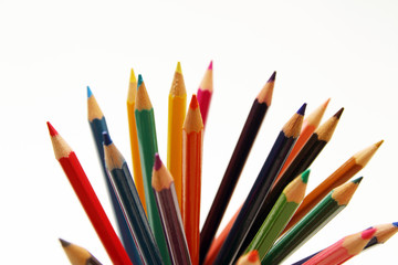 Colored pencils on white background