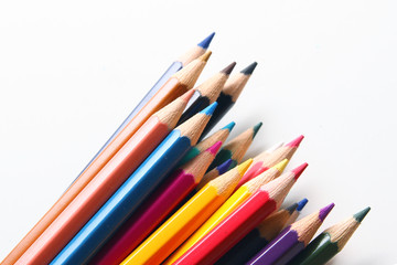 Colored pencils on white background
