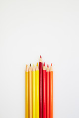 Red and Yellow Color pencils  on white