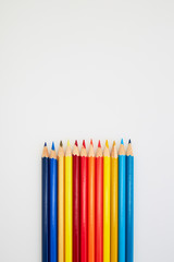 Fototapeta premium Colorful wooden pencils for drawing on white