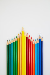 Colorful wooden pencils for drawing on white