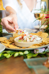 Hand eating  in restaurant