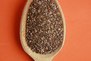 wooden spoon with black chia seeds