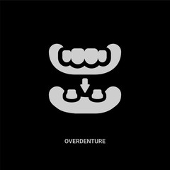 white overdenture vector icon on black background. modern flat overdenture from dentist concept vector sign symbol can be use for web, mobile and logo.