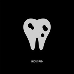 white bicuspid vector icon on black background. modern flat bicuspid from dentist concept vector sign symbol can be use for web, mobile and logo.