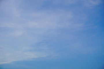 Clear blue sky with white cloud pattern background in sunshine day