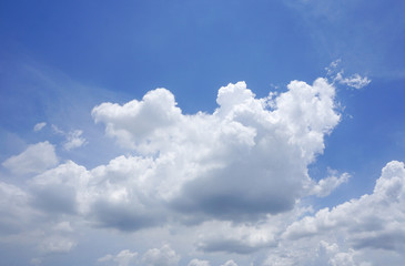 Naklejka na ściany i meble Clear blue sky with white big cloud pattern background in sunshine day,fluffy cumulonimbus