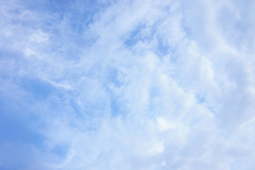 Clear blue sky with white tiny cloud pattern background in sunshine day