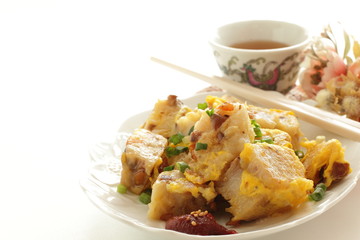 Chinese food, stir fried egg and turnip cake