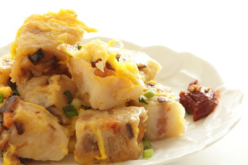 Chinese food, stir fried egg and turnip cake