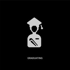 white graduating vector icon on black background. modern flat graduating from education concept vector sign symbol can be use for web, mobile and logo.