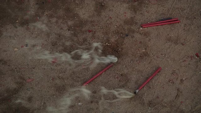 Close Up of Fireworks Popping on Ground