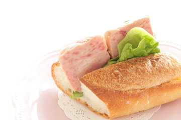 Homemade French bread and luncheon meat sandwich
