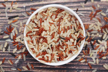 A mixture of brown, white, and red indica rice