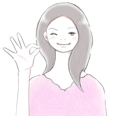 ウインクをするOKサインを出す若い女性