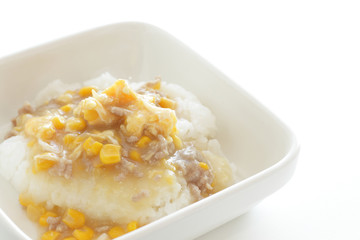 Chinese food, corn and pork mince simmered on rice 