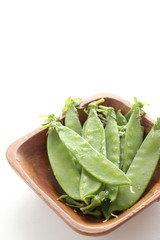 Freshness pea on wooden plate