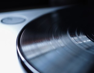 black vinyl record groove texture close up view