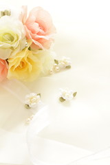 Obraz na płótnie Canvas Elegant ribbon and artificial flower for background image