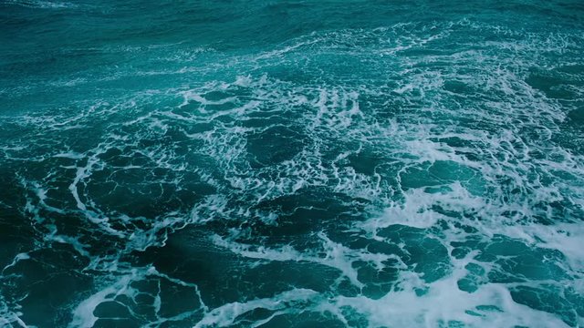 Slow motion of stormy sea surface and breaking waves at Newquay, Cornwall.